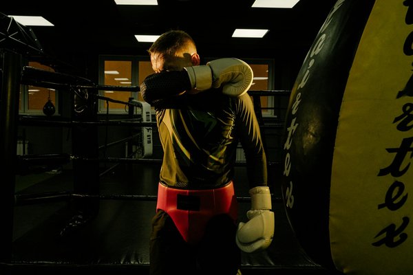 What are the key components of a post-fight recovery plan for UK boxers?